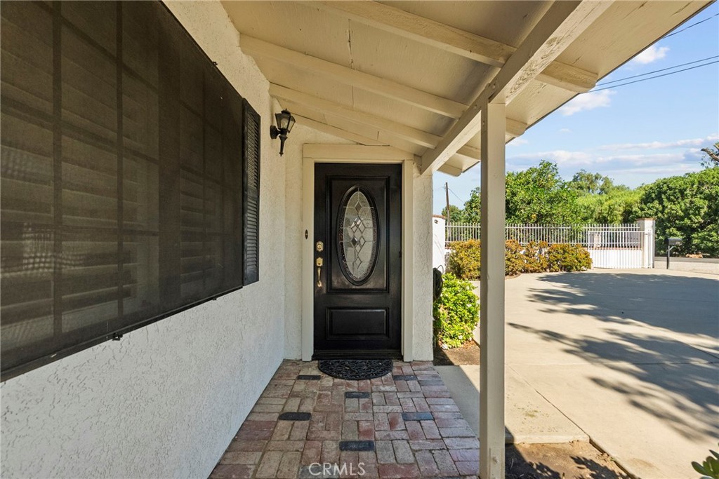 4790 Adam Road Simi Valley, CA 93063 - Photo 7 of 61 a front view of a house with a garden