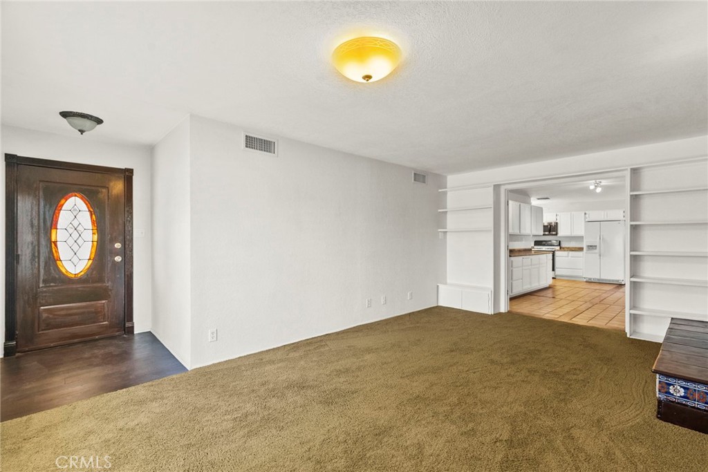 4790 Adam Road Simi Valley, CA 93063 - Photo 9 of 61 a view of empty room with wooden floor