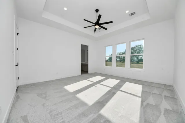 a bathroom with a sink and a large mirror