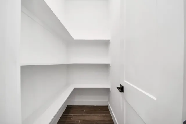 a kitchen with a sink a counter space and a sink