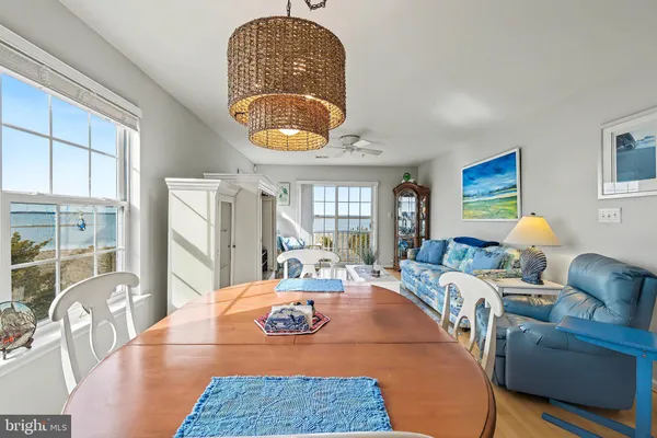 a kitchen with a sink stove top oven and cabinets