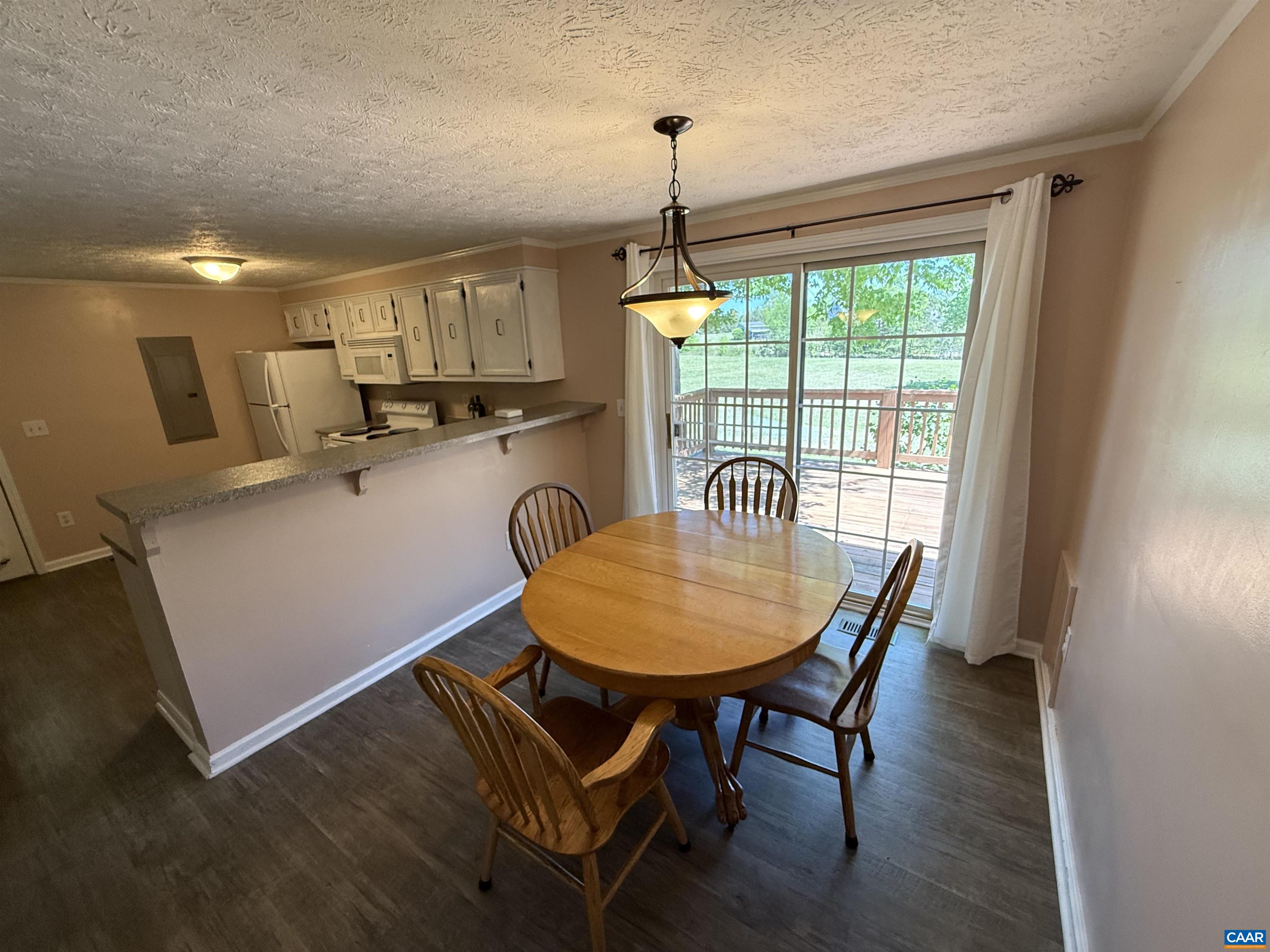2002 Oliver Creek Road Troy, VA 22974 - Photo 10 of 38 a dining room with furniture and window