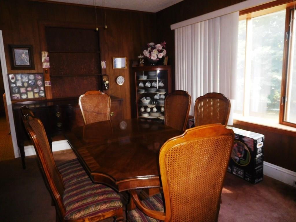 19 Juniper Street Lowell, MA 01852 - Photo 14 of 24 a dining room with furniture and window