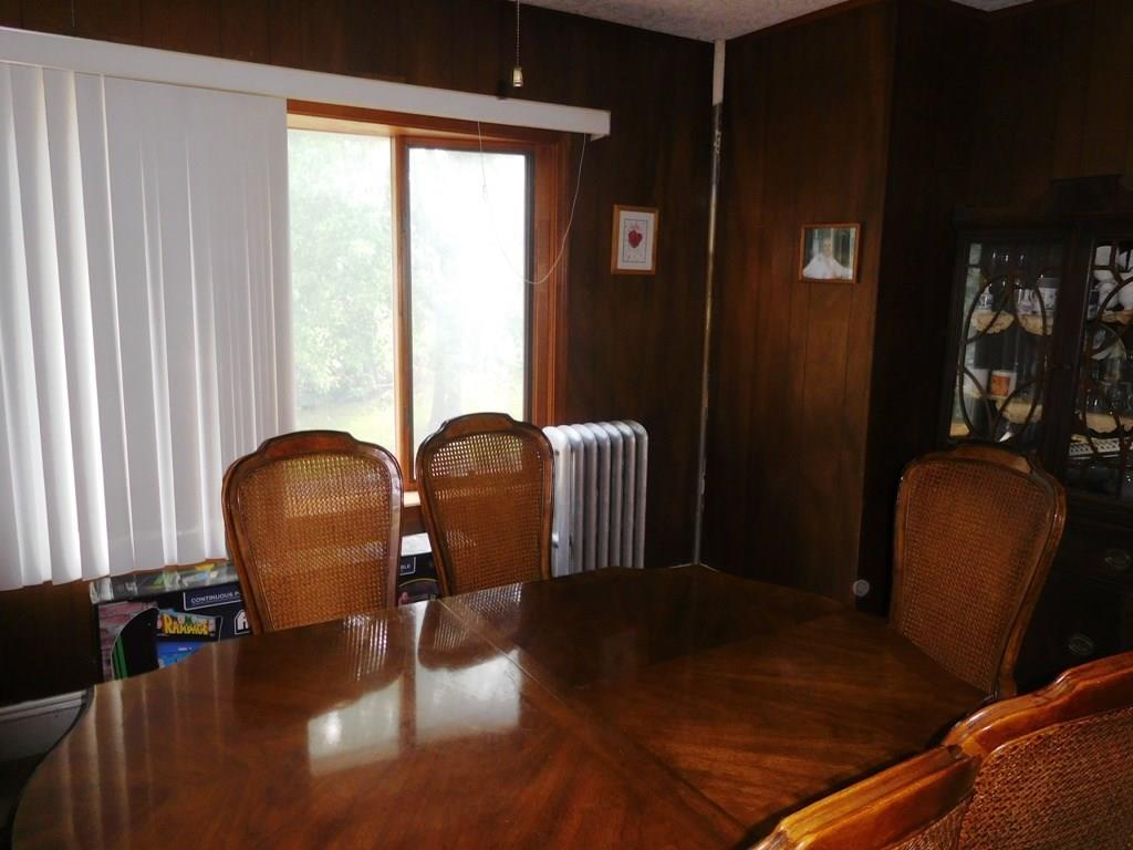 19 Juniper Street Lowell, MA 01852 - Photo 15 of 24 a living room with furniture and wooden floor