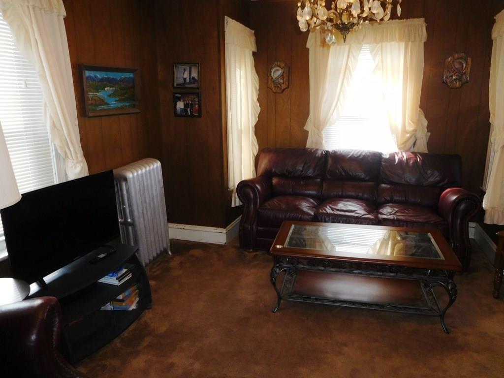 19 Juniper Street Lowell, MA 01852 - Photo 16 of 24 a living room with furniture pool table and window
