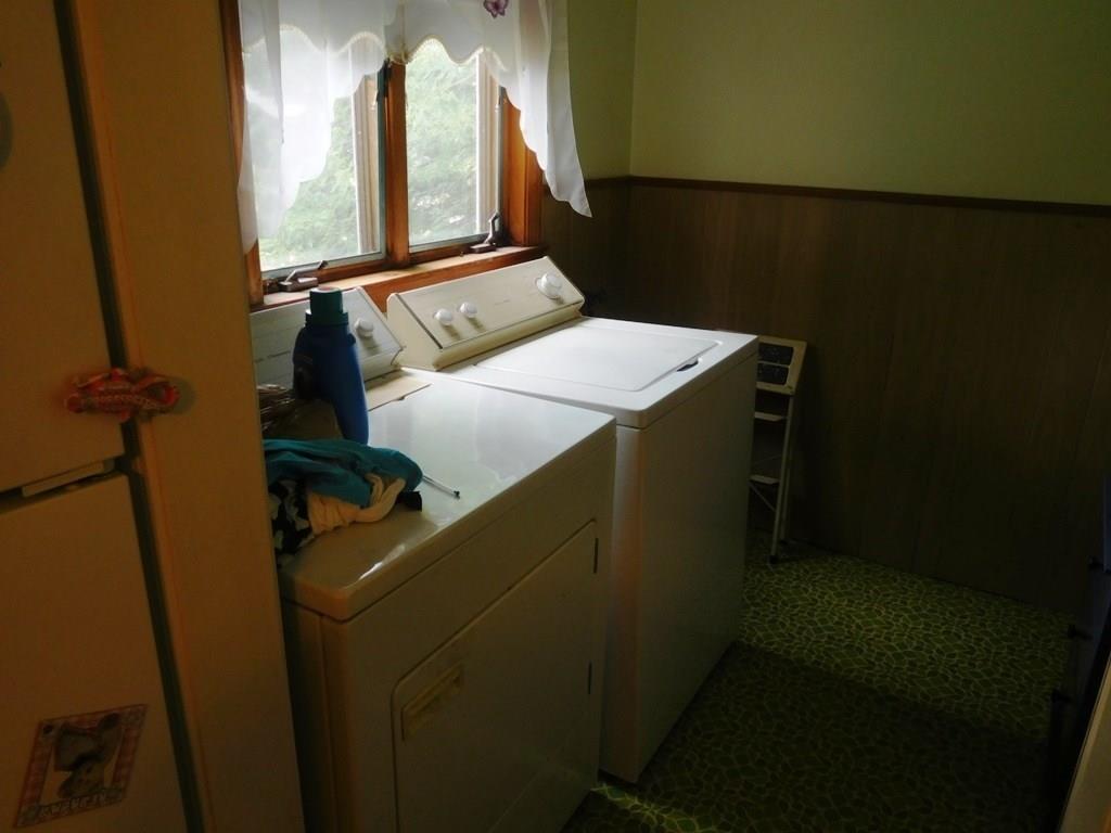 19 Juniper Street Lowell, MA 01852 - Photo 18 of 24 a utility room with dryer and washer