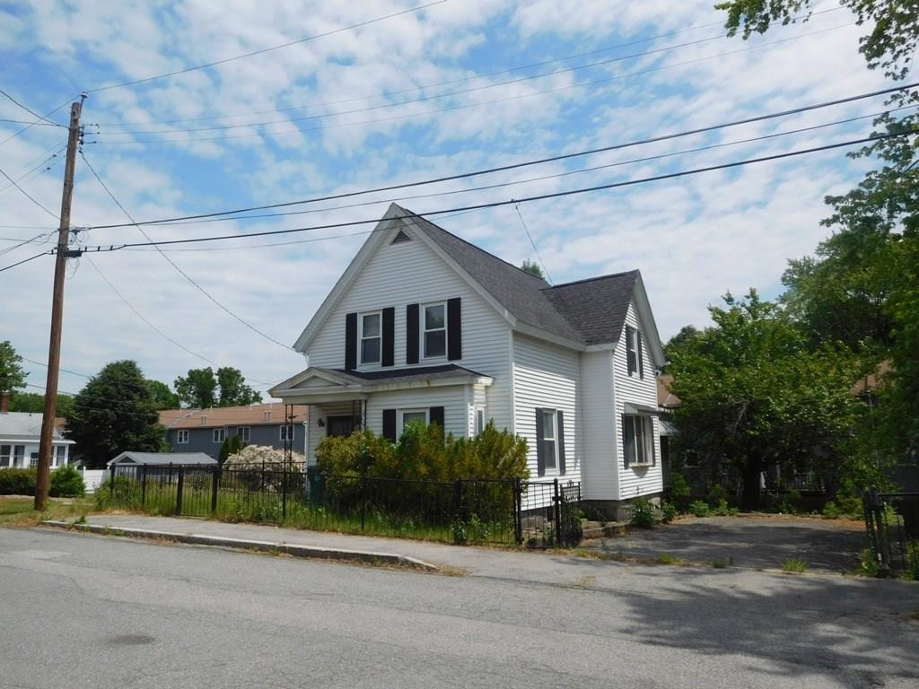 19 Juniper Street Lowell, MA 01852 - Photo 2 of 24 a house view with a outdoor space