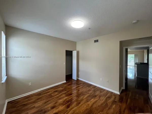a view of an empty room and window