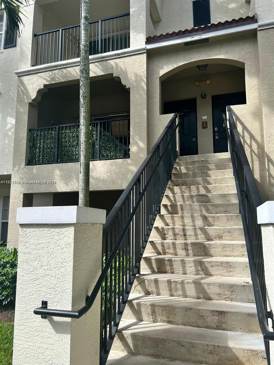 5940 West Sample Road, Unit 304 Coral Springs, FL 33067 - Photo 2 of 18 a view of entryway