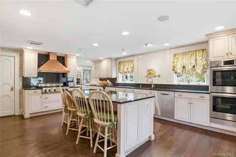 a kitchen with counter top space and sink