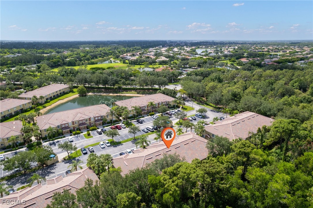 9460 Ivy Brook Run, Unit 710 Fort Myers, FL 33913 - Photo 15 of 23 an aerial view of a houses with a lake view