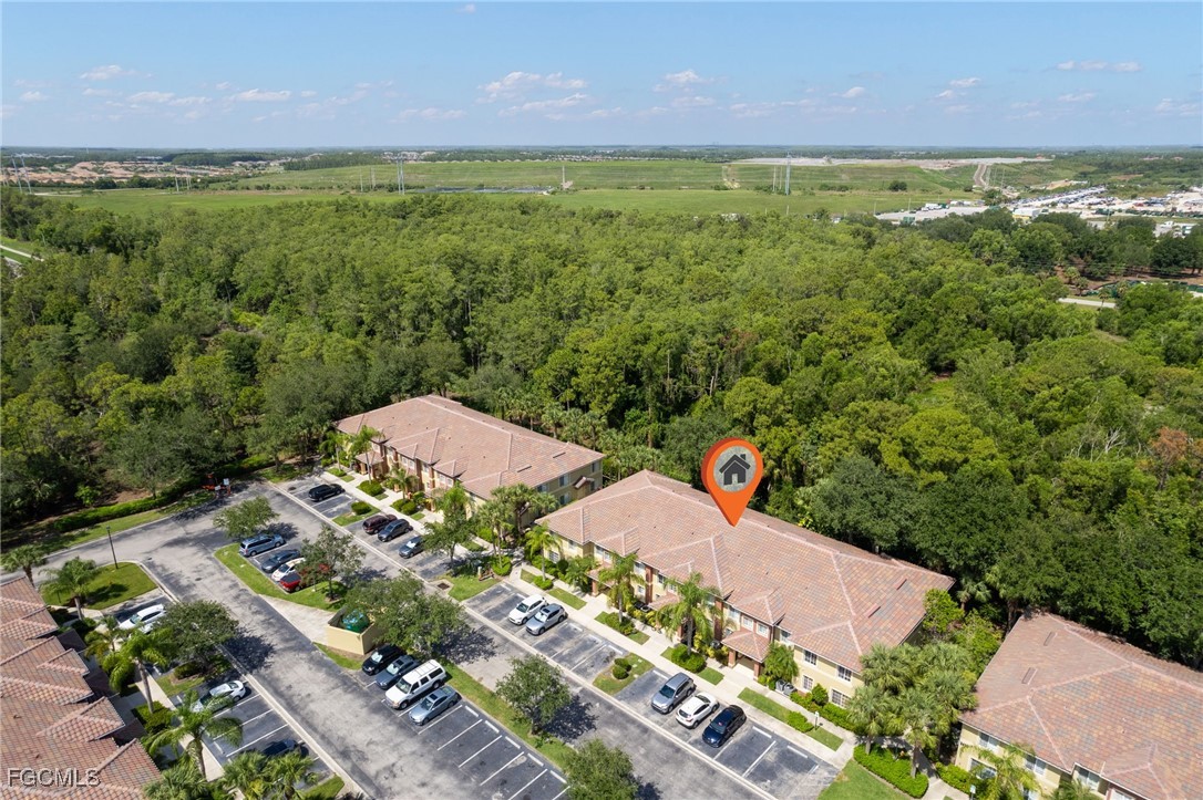 9460 Ivy Brook Run, Unit 710 Fort Myers, FL 33913 - Photo 16 of 23 a view of a outdoor space and a garden