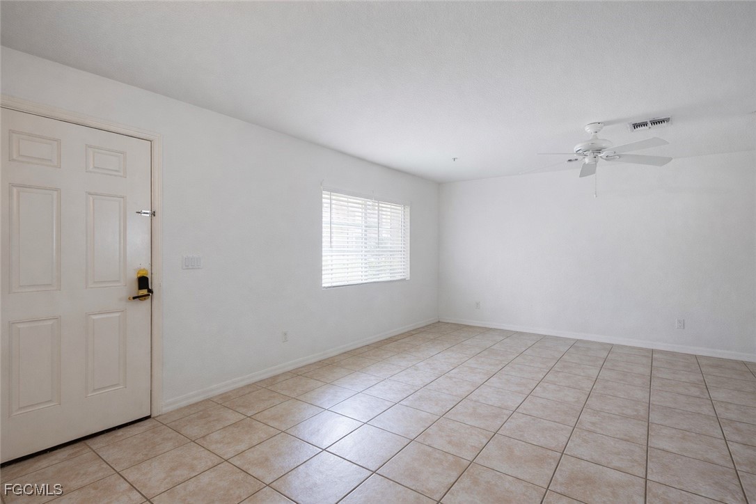 9460 Ivy Brook Run, Unit 710 Fort Myers, FL 33913 - Photo 2 of 23 a view of an empty room and window