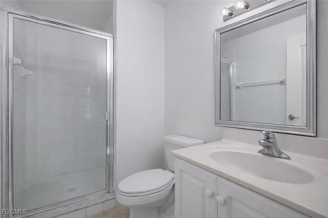 9460 Ivy Brook Run, Unit 710 Fort Myers, FL 33913 - Photo 6 of 23 a bathroom with a sink toilet and vanity