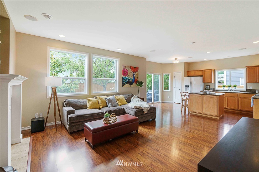 677 Shadow Avenue Northeast Renton, WA 98059 - Photo 14 of 40 a living room with furniture and a large window