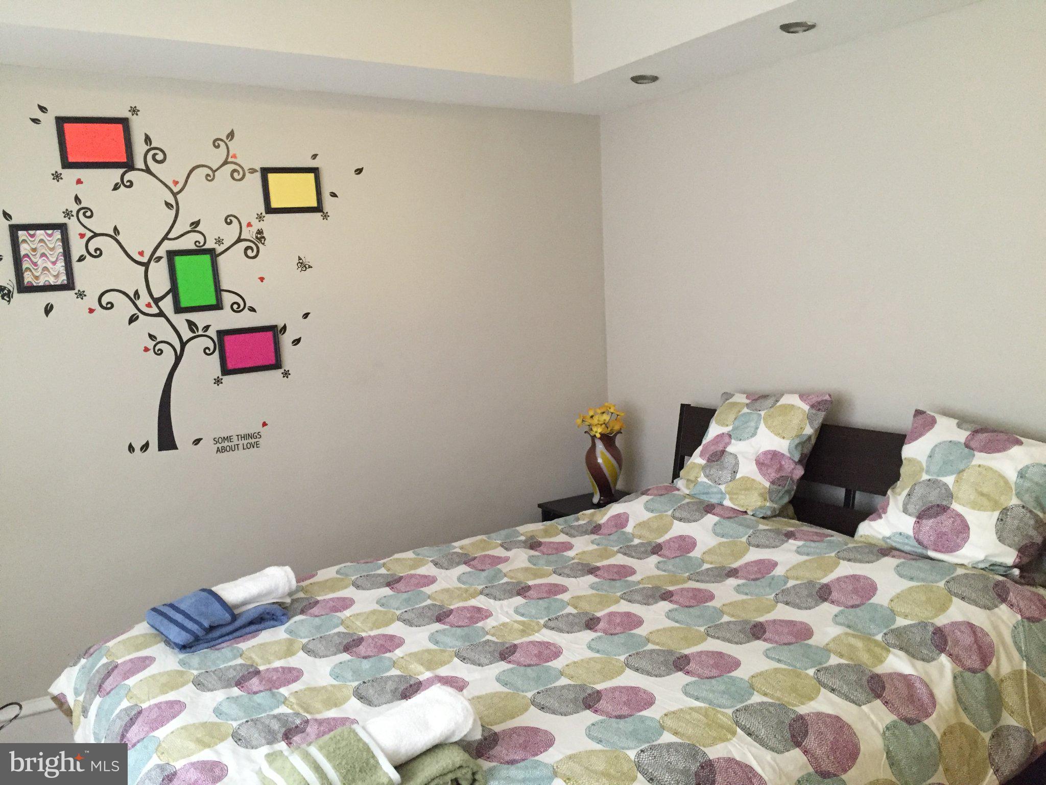 527 South 7th Street, Unit 1 Philadelphia, PA 19147 - Photo 3 of 11 Vibrant bedroom with playful decor.
