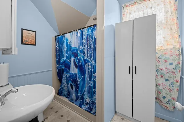 a bathroom with a sink and a toilet