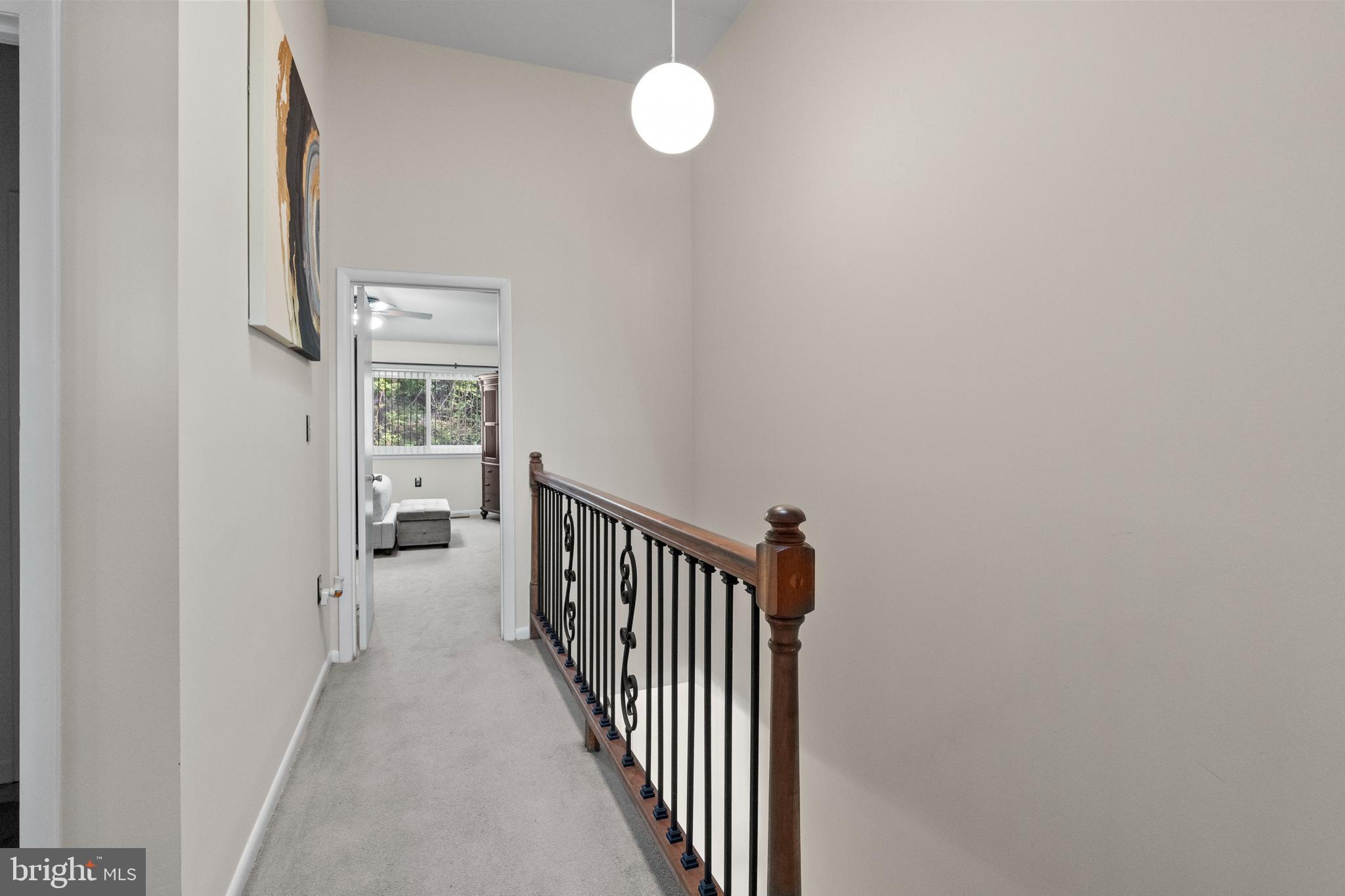 8101 Greenspring Way, Unit 8101E Owings Mills, MD 21117 - Photo 30 of 35 Upper Level Landing