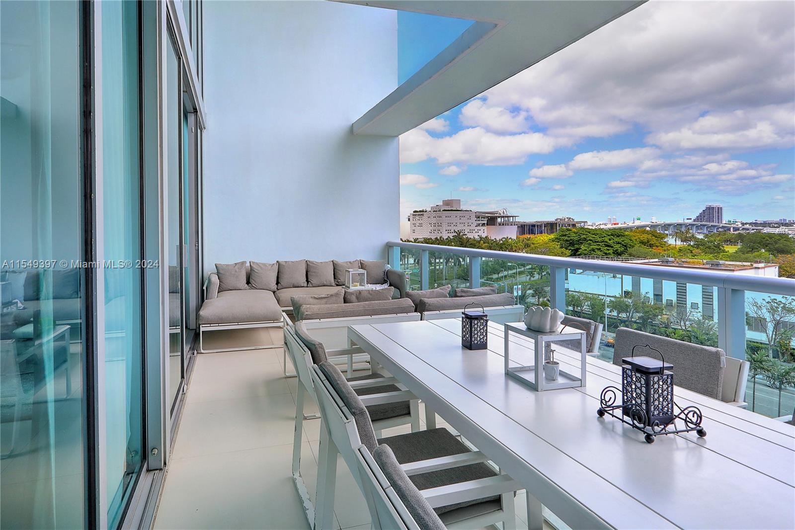 900 Biscayne Boulevard, Unit 705 Miami, FL 33132 - Photo 15 of 30 a view of roof deck with seating area and furniture
