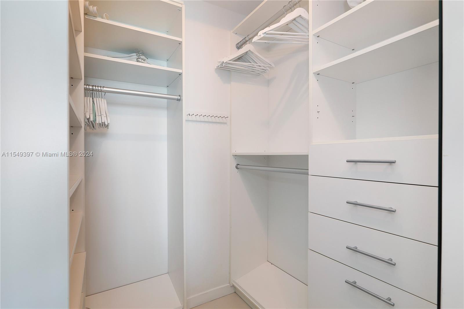 900 Biscayne Boulevard, Unit 705 Miami, FL 33132 - Photo 23 of 30 a view of a walk in closet