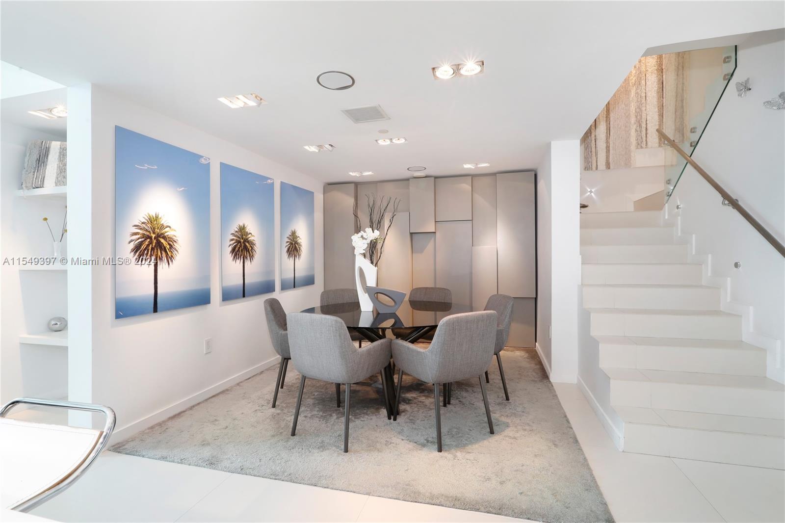 900 Biscayne Boulevard, Unit 705 Miami, FL 33132 - Photo 6 of 30 a view of a dining room with furniture