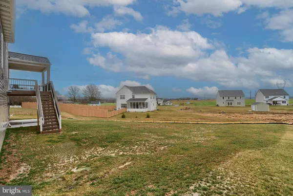 a view of a lake with a big yard