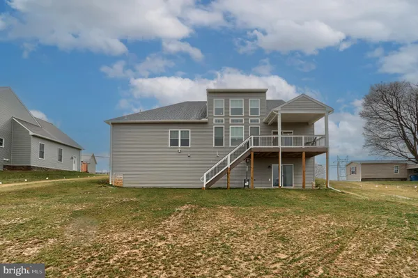a house with yard in front of it
