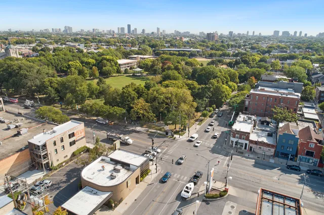 an aerial view of a city with lots of residential buildings