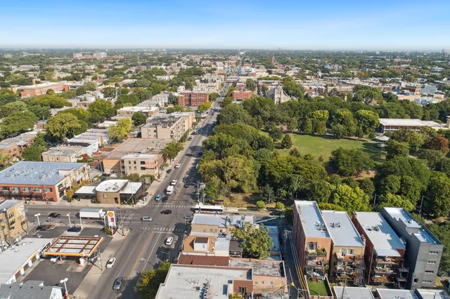 an aerial view of a city with lots of residential buildings