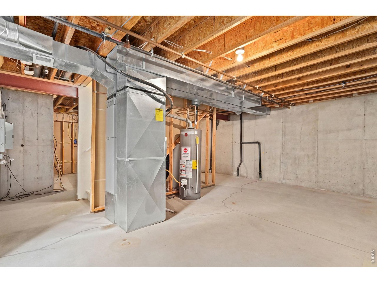 2702 Rigden Parkway, Unit 5 Fort Collins, CO 80525 - Photo 26 of 31 Furnace, central air conditioning, and water heater 2022. Active radon mitigation system.