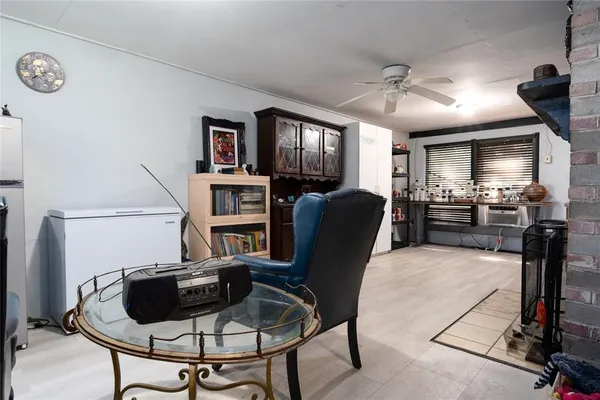 a kitchen with stainless steel appliances granite countertop a refrigerator and a stove