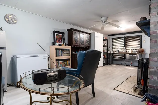 a kitchen with stainless steel appliances granite countertop a refrigerator and a stove