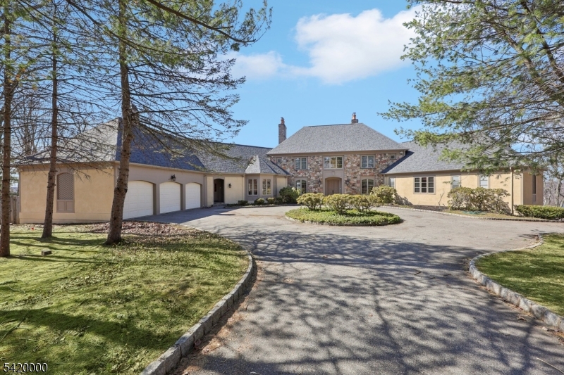 29 Hilltop Road Kinnelon, NJ 07405 - Photo 1 of 50 a view of a house with backyard and sitting area
