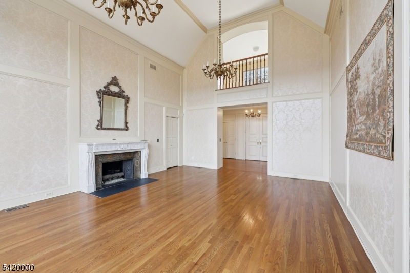 29 Hilltop Road Kinnelon, NJ 07405 - Photo 12 of 50 a view of empty room with wooden floor and fireplace