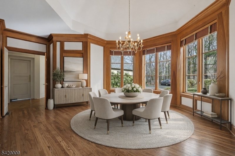 29 Hilltop Road Kinnelon, NJ 07405 - Photo 14 of 50 a view of a dining room with furniture large windows and wooden floor