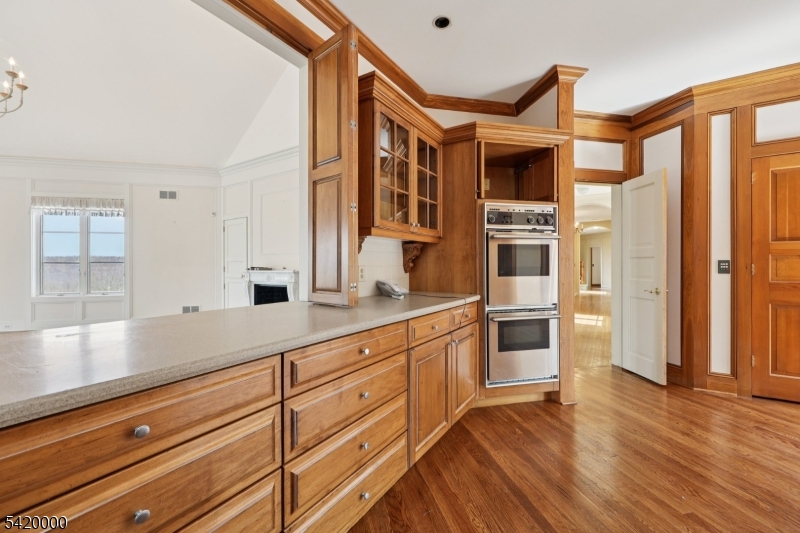 29 Hilltop Road Kinnelon, NJ 07405 - Photo 16 of 50 a kitchen with stainless steel appliances granite countertop a refrigerator and a sink