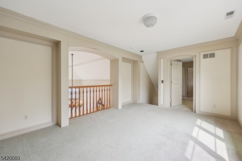 29 Hilltop Road Kinnelon, NJ 07405 - Photo 29 of 50 a view of an empty room with a window