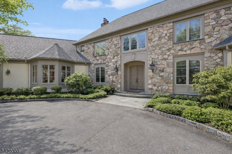 29 Hilltop Road Kinnelon, NJ 07405 - Photo 3 of 50 a front view of a house with garden