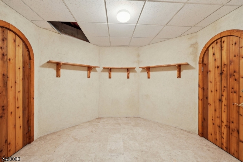 29 Hilltop Road Kinnelon, NJ 07405 - Photo 37 of 50 a view of an empty room with wooden floor