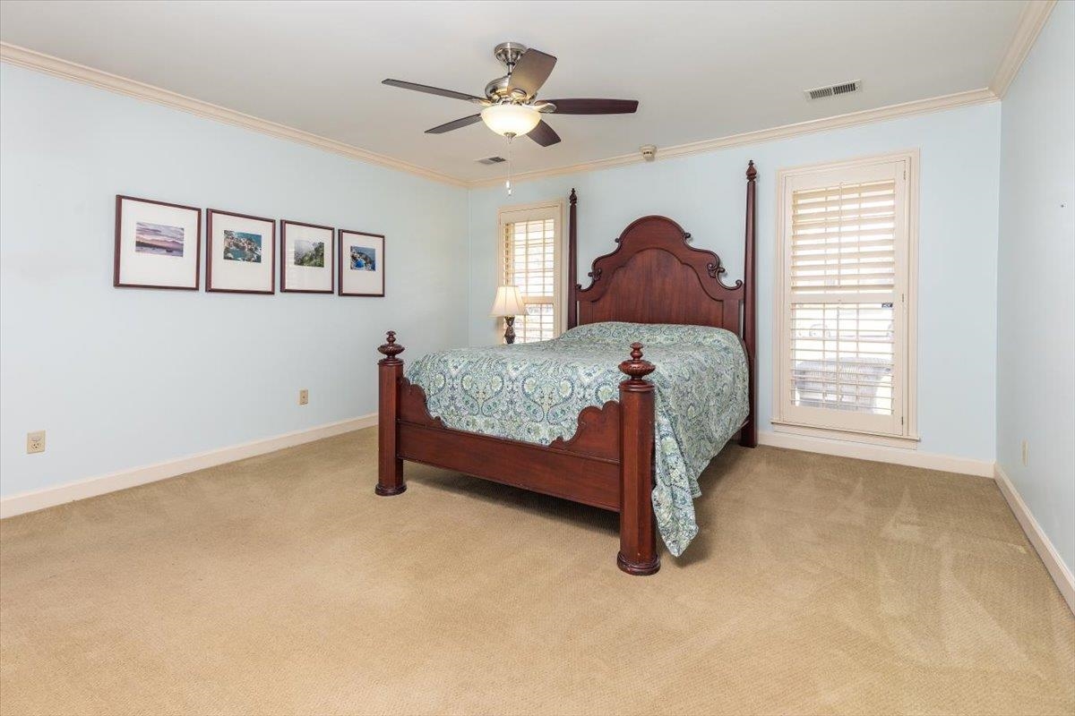 295 Spring Mill Road Collierville, TN 38017 - Photo 17 of 31 a bedroom with a bed and a window