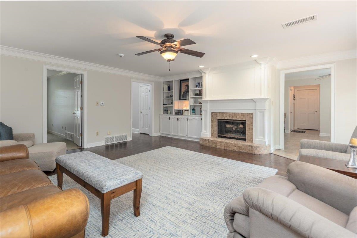 295 Spring Mill Road Collierville, TN 38017 - Photo 3 of 31 a living room with furniture and a fireplace
