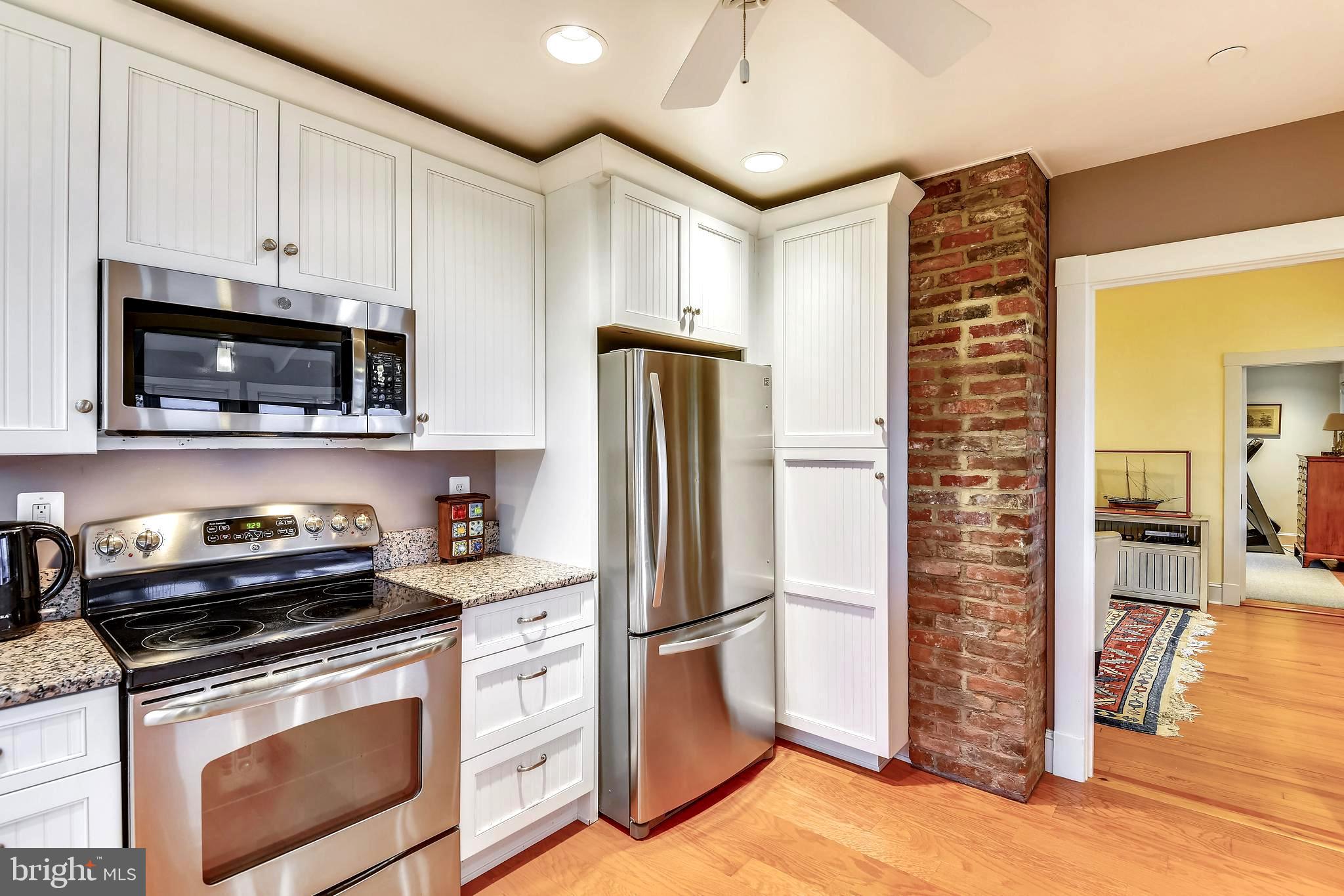 1212 Hayes Road Shady Side, MD 20764 - Photo 19 of 45 High-End Stainless Appliances . Exposed Brick