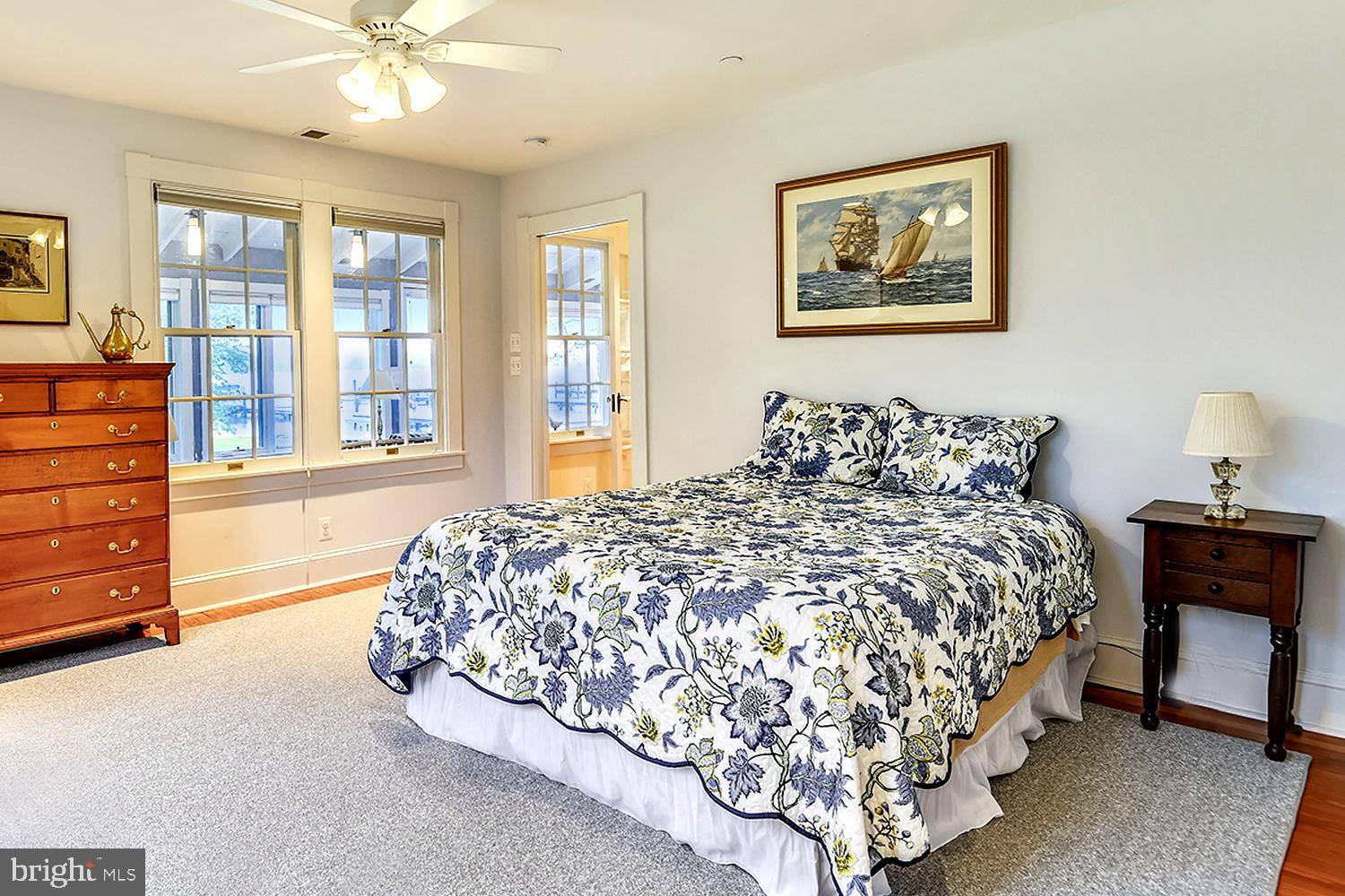 1212 Hayes Road Shady Side, MD 20764 - Photo 22 of 45 Main Level Water View Primary Bedroom Suite