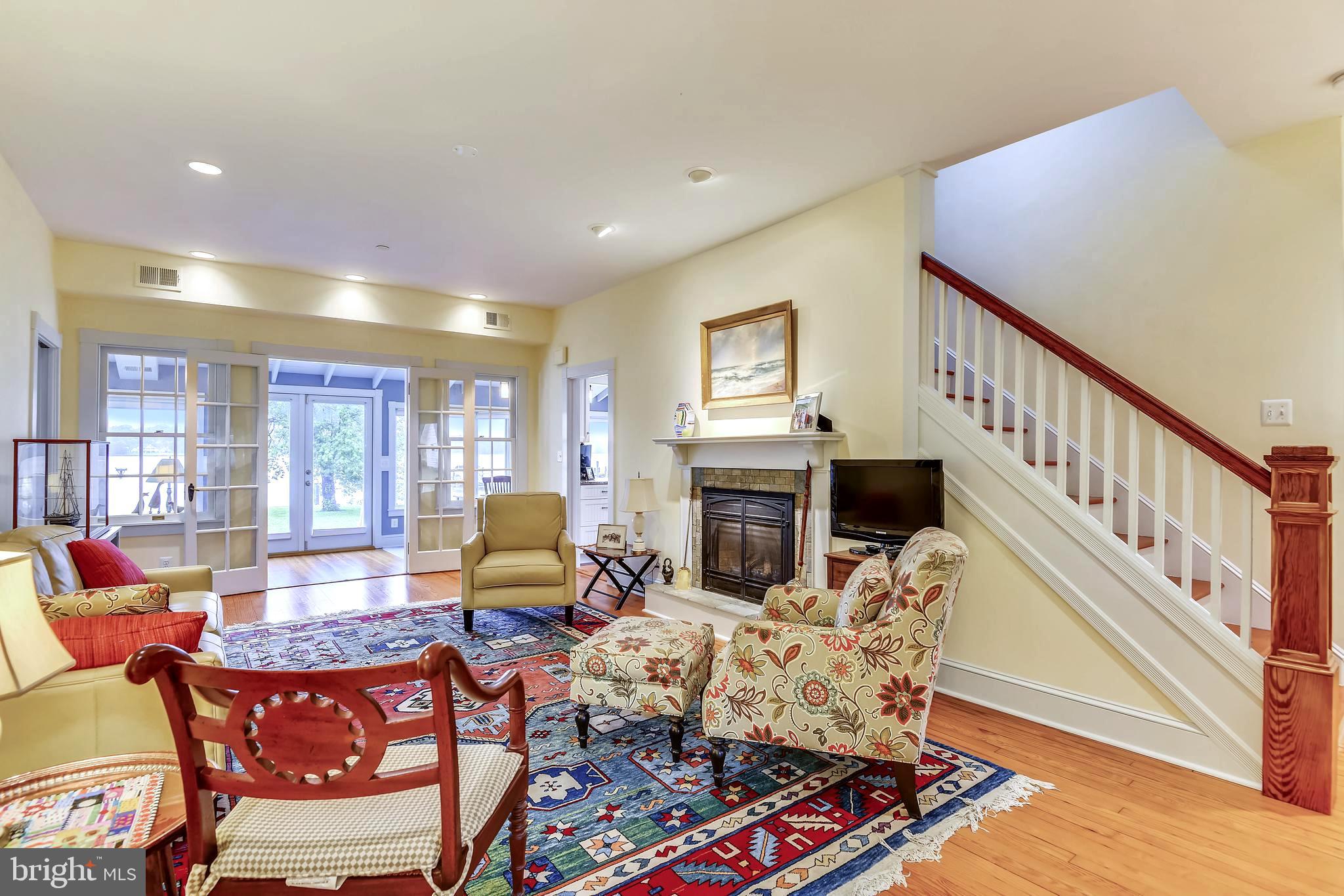 1212 Hayes Road Shady Side, MD 20764 - Photo 9 of 45 Living Room Showcasing Hardwood Floors