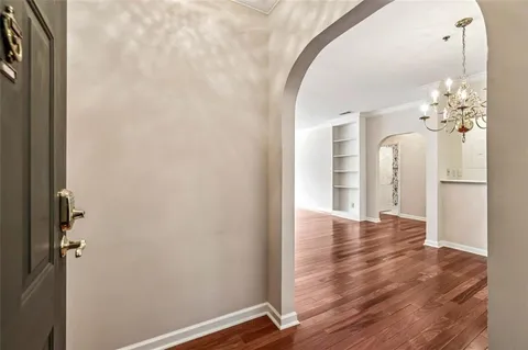a view of a livingroom with wooden floor