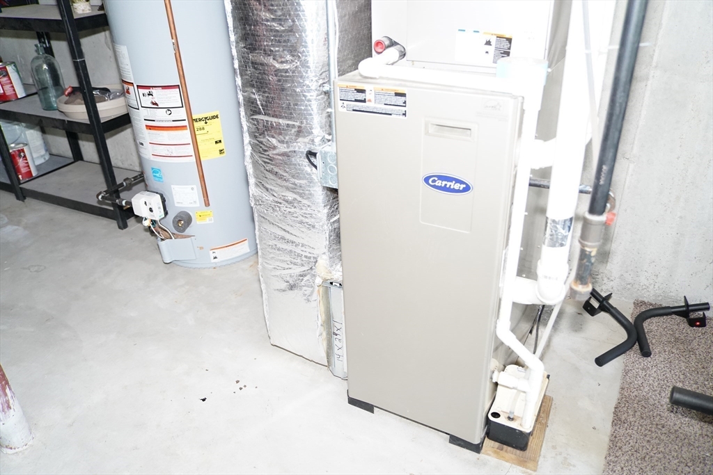 7 Turtle Hill Road, Unit B Ayer, MA 01432 - Photo 35 of 42 a utility room with dryer and washer