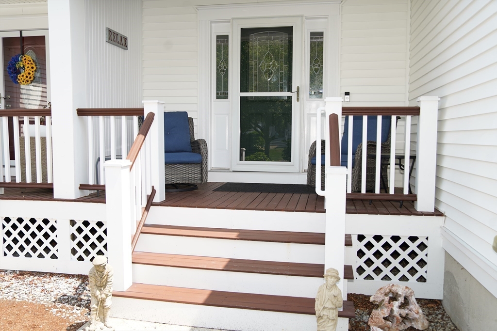 7 Turtle Hill Road, Unit B Ayer, MA 01432 - Photo 39 of 42 a view of a porch with wooden floor