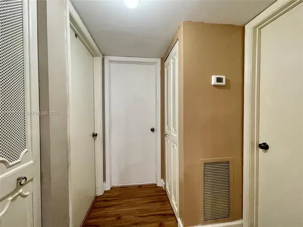 a view of a bathroom with sink and shower