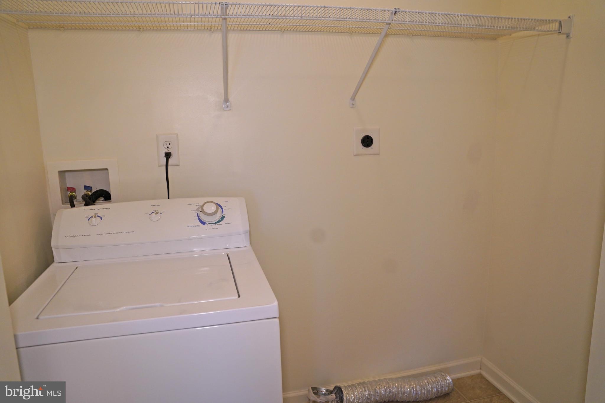 122 Sinker Drive Inwood, WV 25428 - Photo 13 of 28 a utility room with dryer and washer