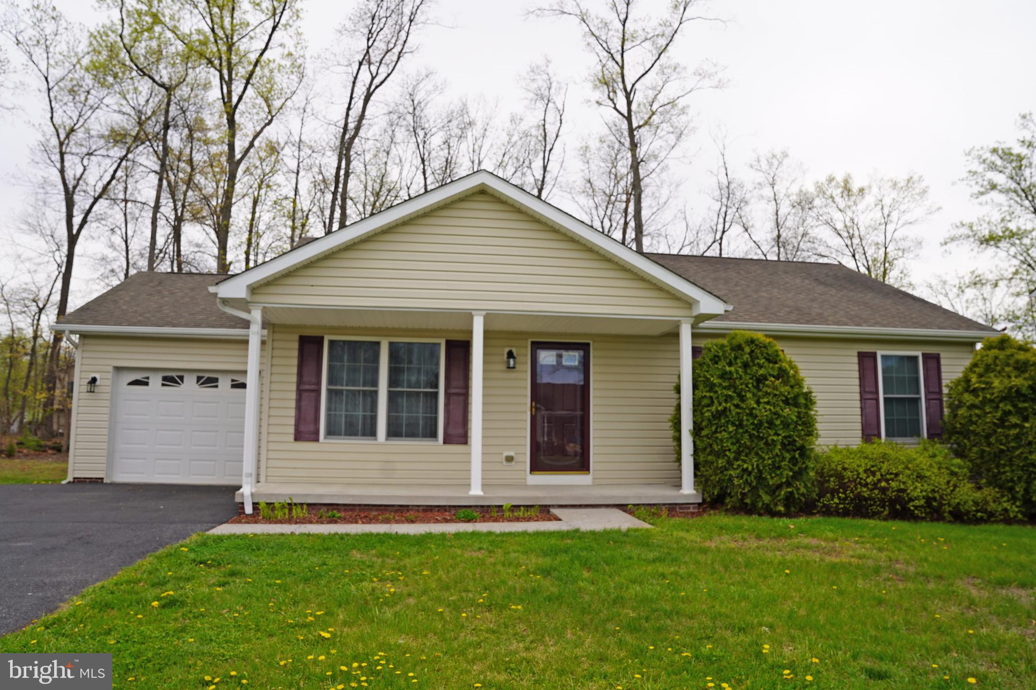 122 Sinker Drive Inwood, WV 25428 - Photo 21 of 28 a view of a house with a yard